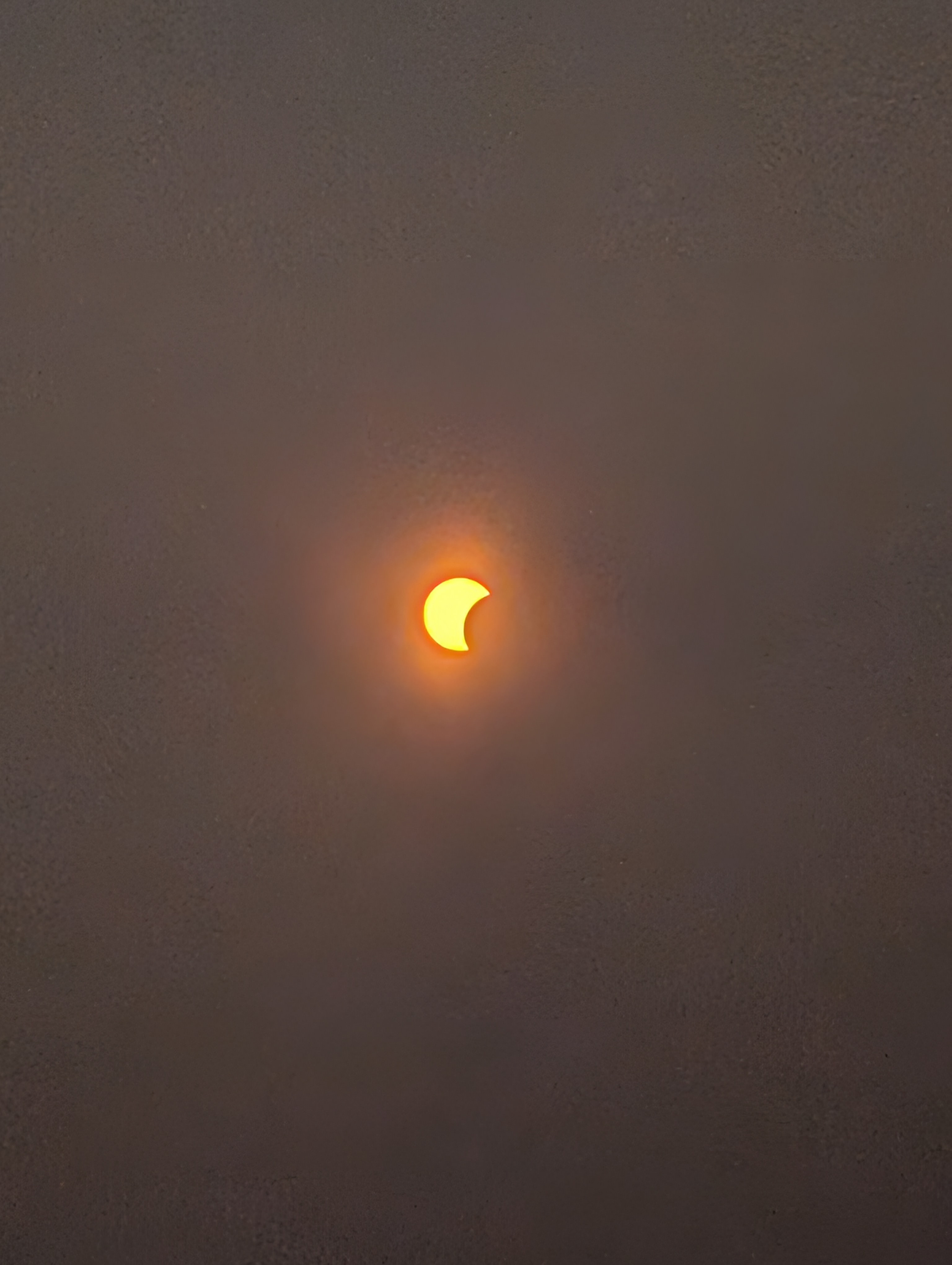 Sun slightly covered from the right